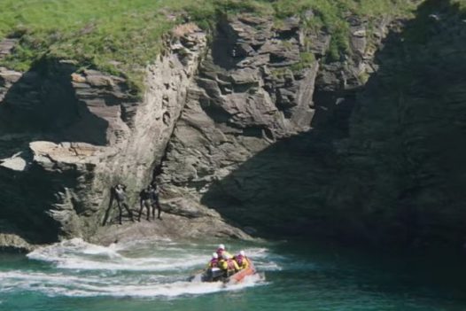 A rescue scene in the Fisherman's Friends film at Port Gaverne