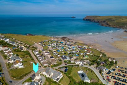 Aerial view of Polzeath showing Ivy Cottage's proximity to the beach
