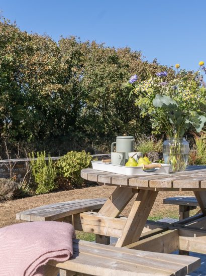 Patio at Penhwedhi, a self-catering holiday flat in Polzeath, North Cornwall