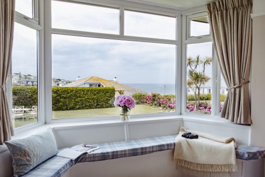 Window seat in living room at Spindrift, a self-catering holiday home in Polzeath, North Cornwall