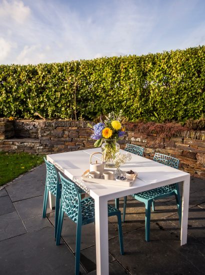 Outdoor table at The Barn, a self-catering holiday home near Polzeath, North Cornwall