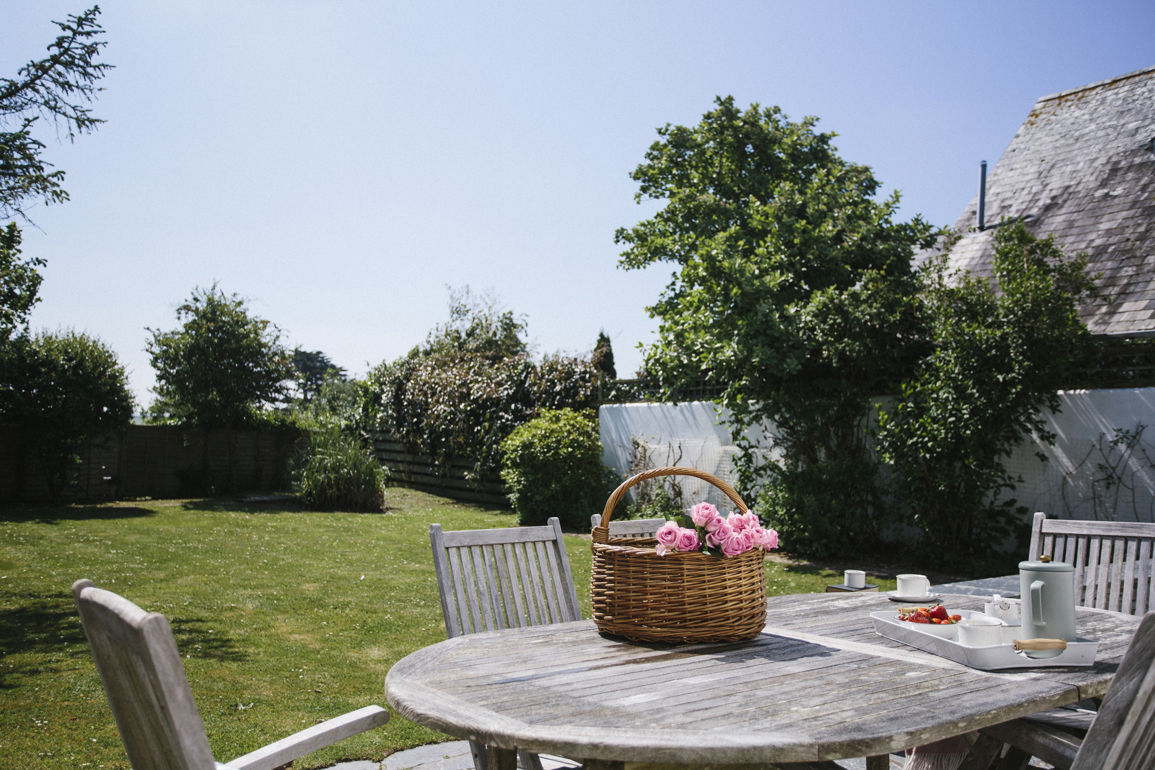 Outdoor furniture on the terrace at The Crispin, a self-catering holiday home in Rock, North Cornwall