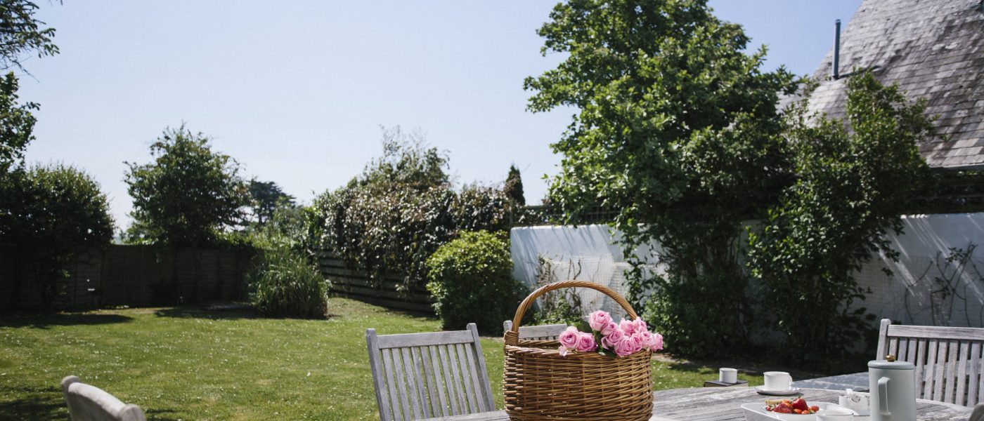 Outdoor furniture on the terrace at The Crispin, a self-catering holiday home in Rock, North Cornwall