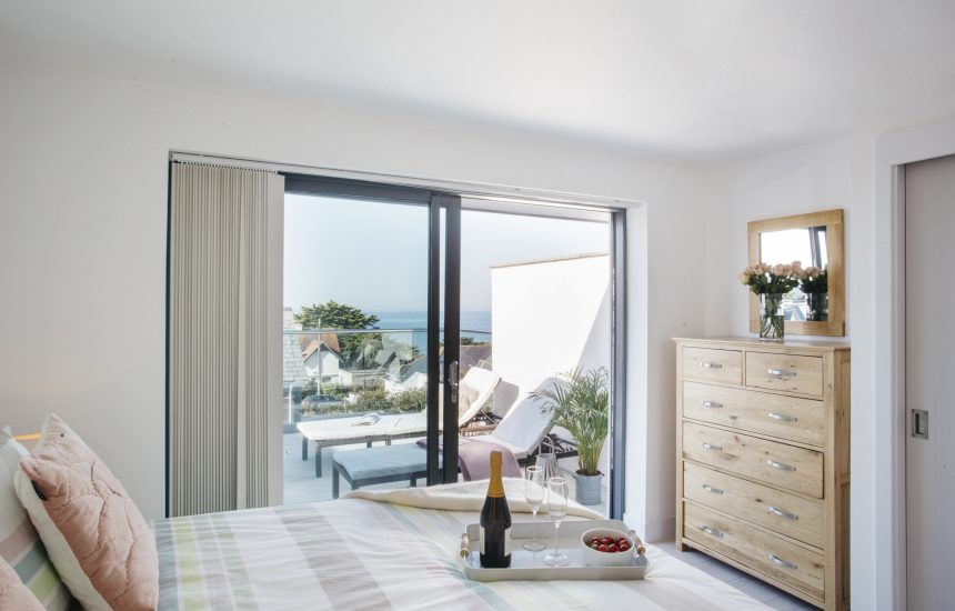 Master bedroom at The Penthouse, a luxury apartment in New Polzeath, North Cornwall